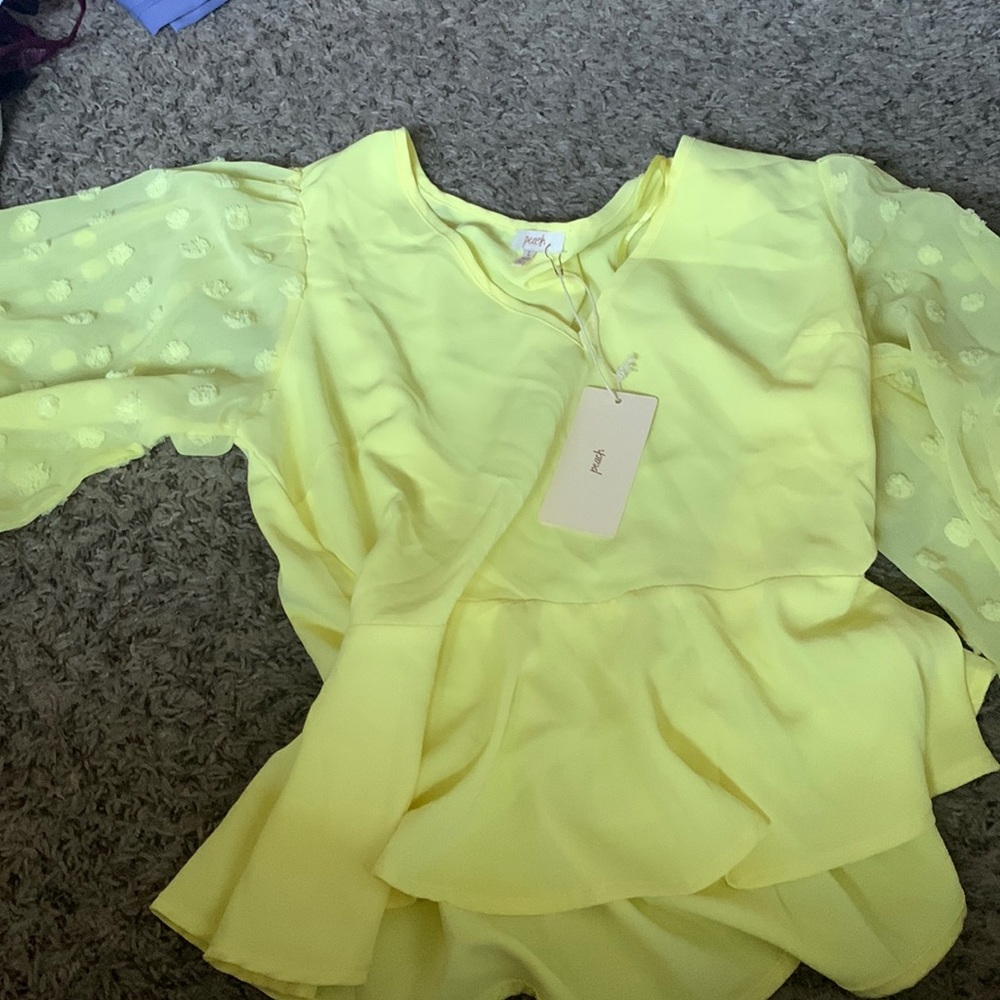 Yellow shirt from peach.